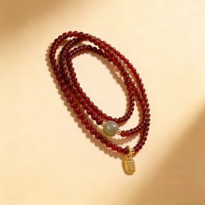Alternative view of Natural Crystal Garnet Rose Quartz Hetian Jade Three-loop Blessing Bracelet