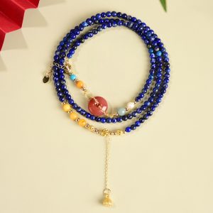 Elevate your style with this 2-in-1 lapis lazuli beeswax bracelet necklace! Handcrafted with natural Nanhong Ping'an buckle, this Chinese palace-style multi-layer crystal jewelry is a perfect vintage gift for women who love ethnic and healing crystal accessories.